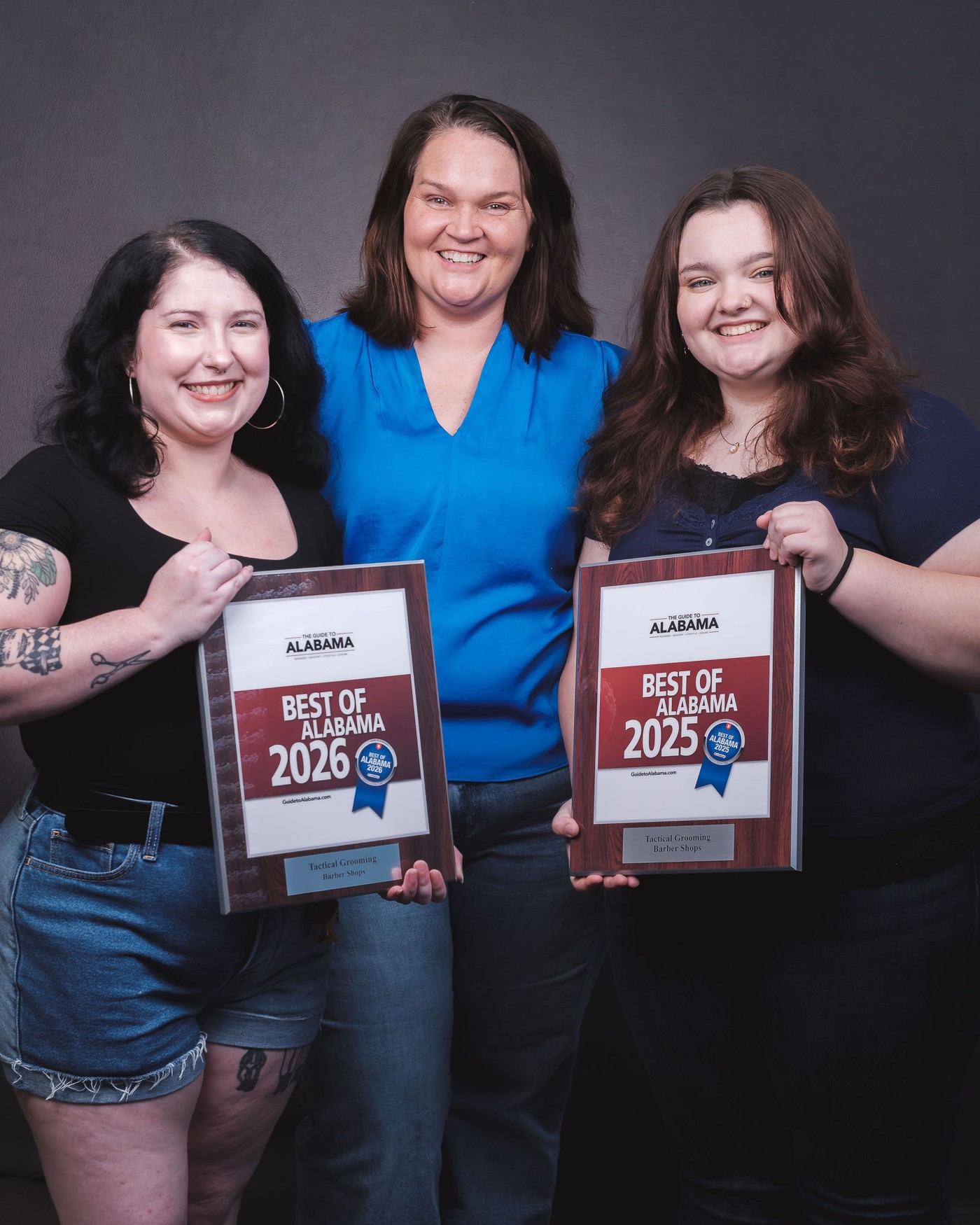 Tactical Grooming team holding Best of Alabama awards for 2025 and 2026