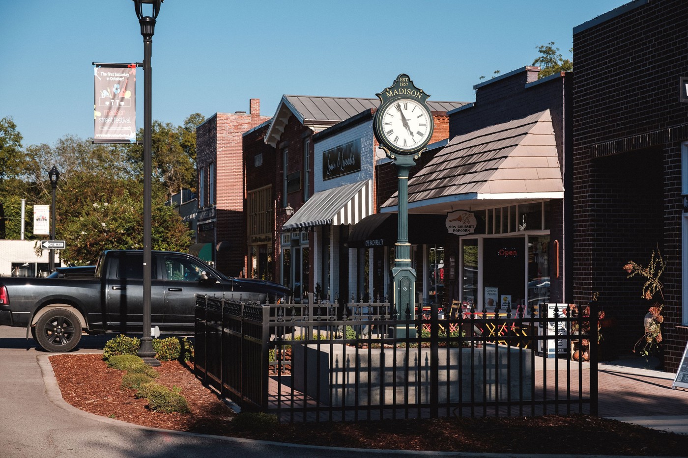 The town clock and storefronts in Historic Downtown Madison