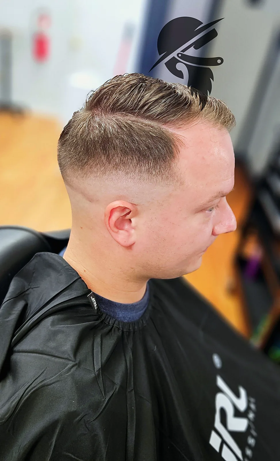 Fade haircut at Tactical Grooming
