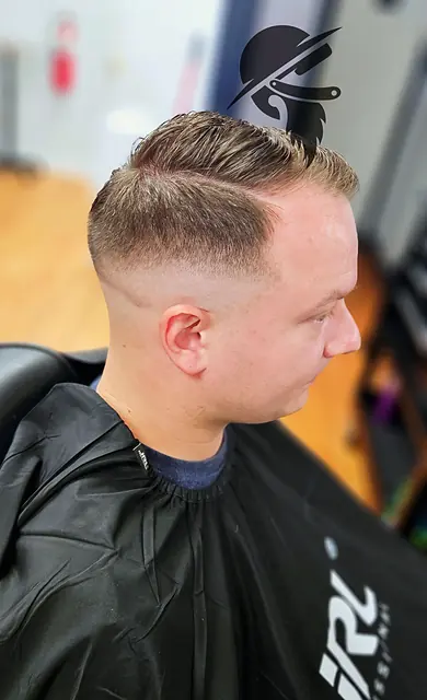 Fade haircut at Tactical Grooming