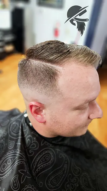 Fade haircut at Tactical Grooming