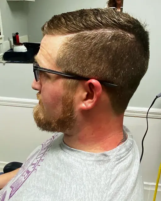 Fade haircut at Tactical Grooming