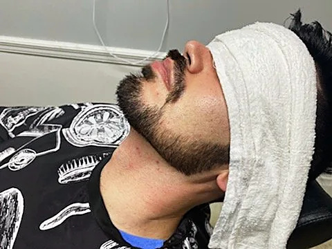 Hot towel treatment at Tactical Grooming