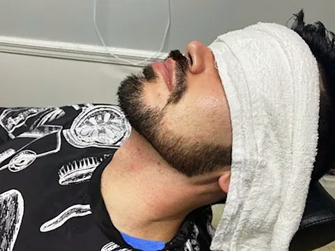 Hot towel treatment at Tactical Grooming