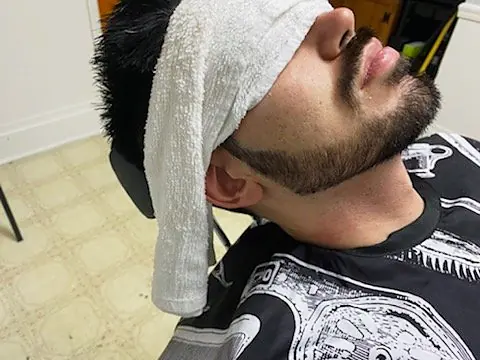 Hot towel treatment at Tactical Grooming