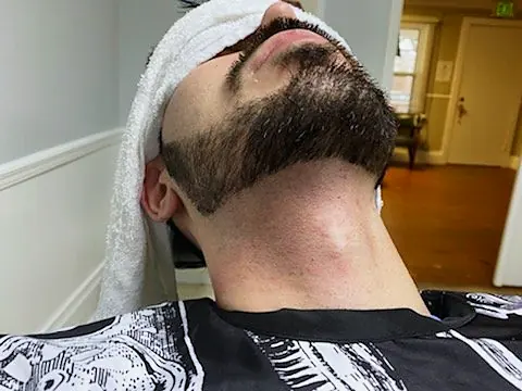 Hot towel treatment at Tactical Grooming