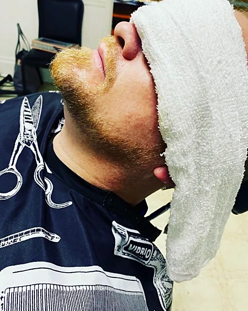Hot towel treatment at Tactical Grooming
