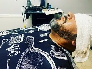 Hot towel treatment at Tactical Grooming