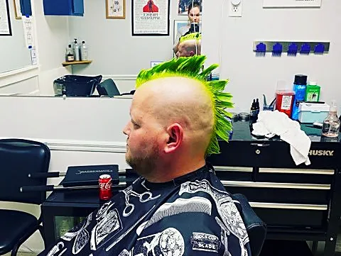 Colored mohawk styled at Tactical Grooming