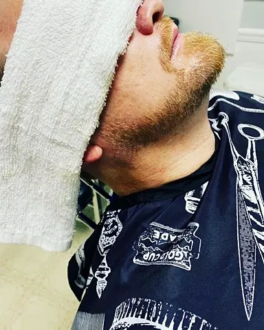 Hot towel treatment at Tactical Grooming