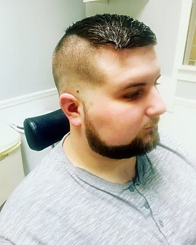 Fade haircut at Tactical Grooming