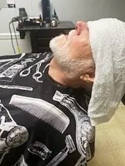 Hot towel treatment at Tactical Grooming