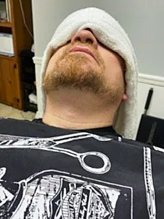 Hot towel treatment at Tactical Grooming