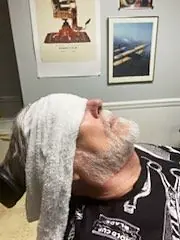 Hot towel treatment at Tactical Grooming